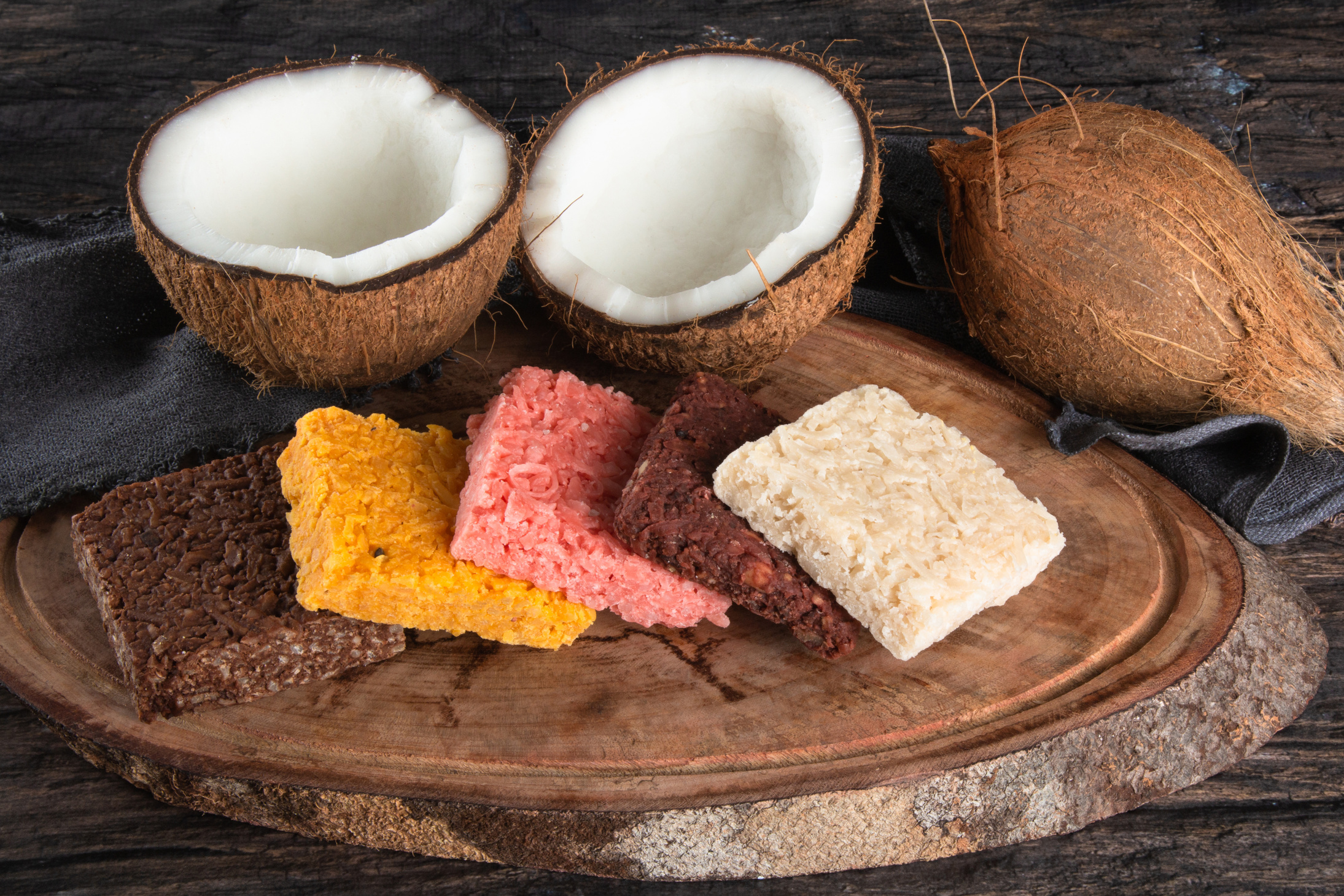 Cocada coconut candy, sweet Brazilian in rustic wood background